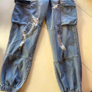 High-Waisted Ripped Jeans with Cinched ankles